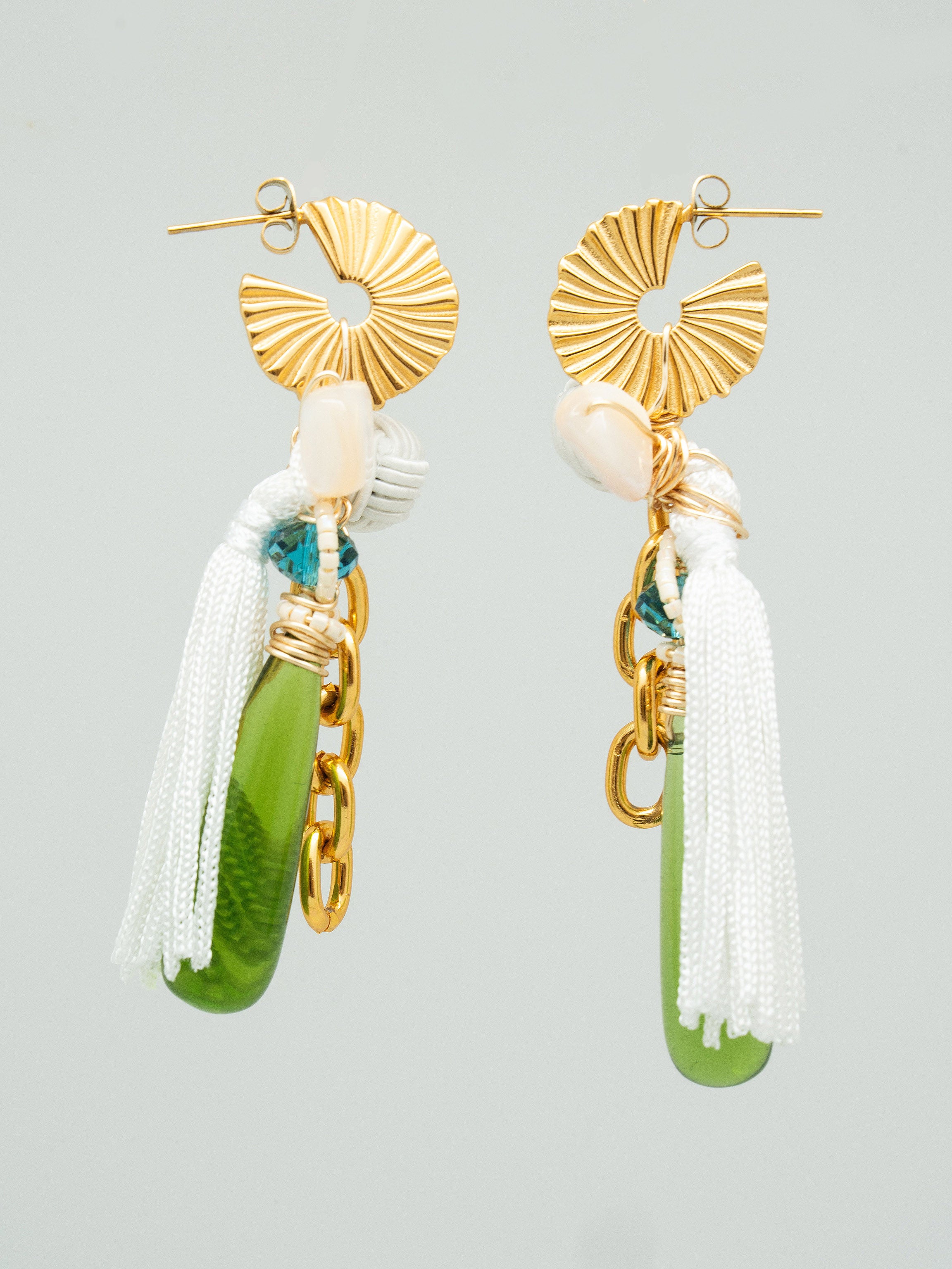 Drop earrings with green czech glass beads, swarovski crystals, and white tassels