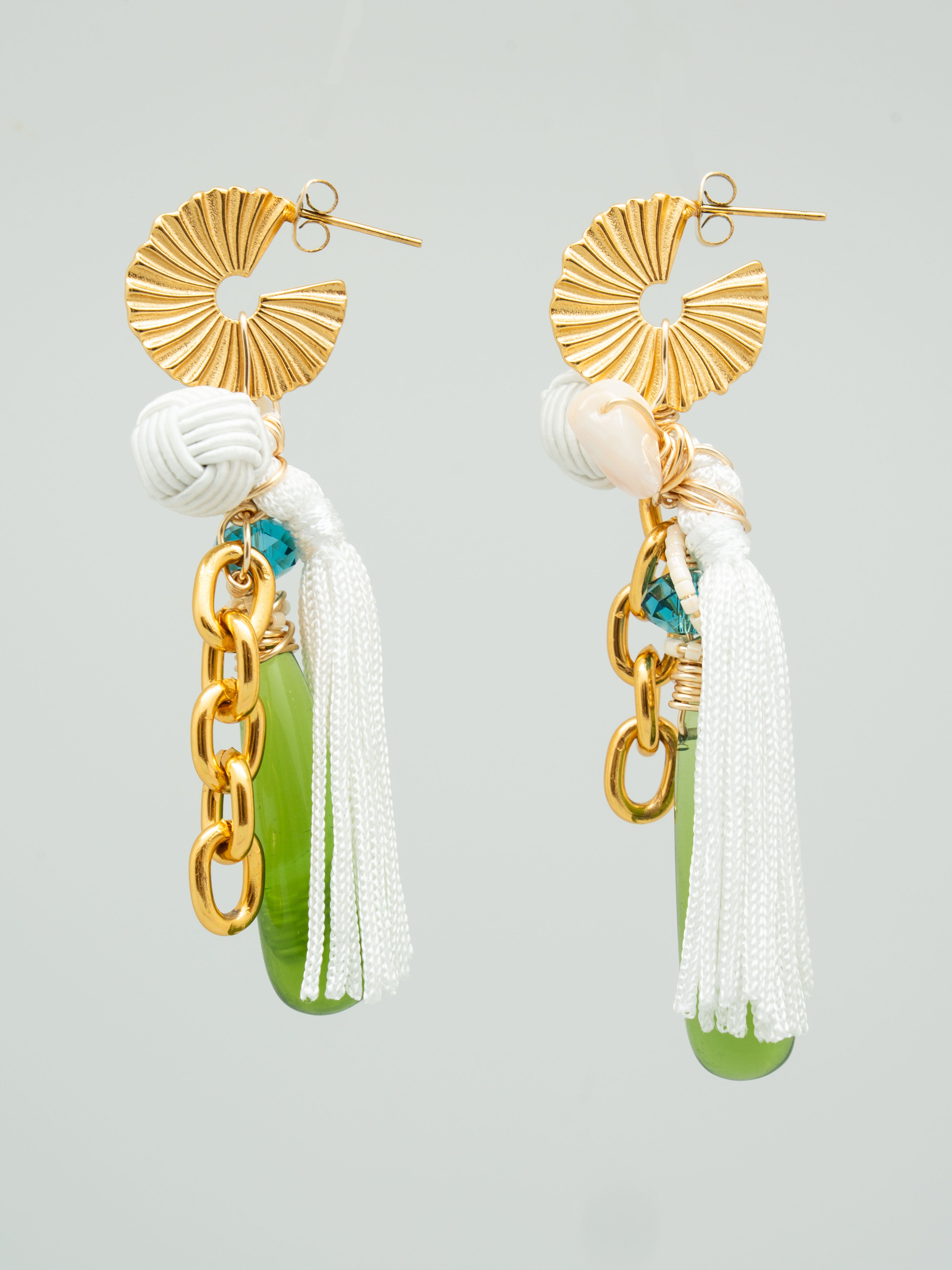 Drop earrings with green czech glass beads, swarovski crystals, and white tassels