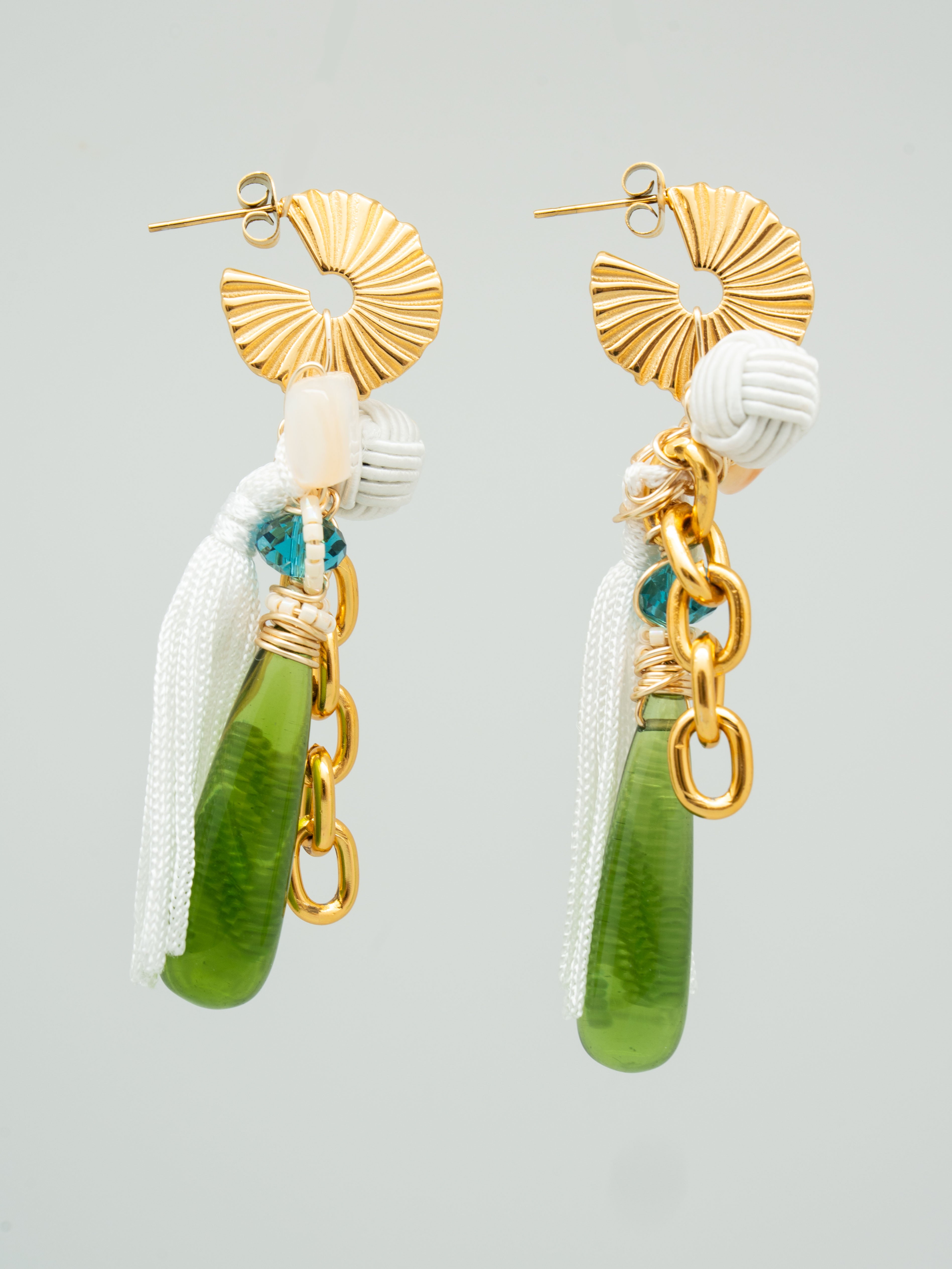 Drop earrings with green czech glass beads, swarovski crystals, and white tassels