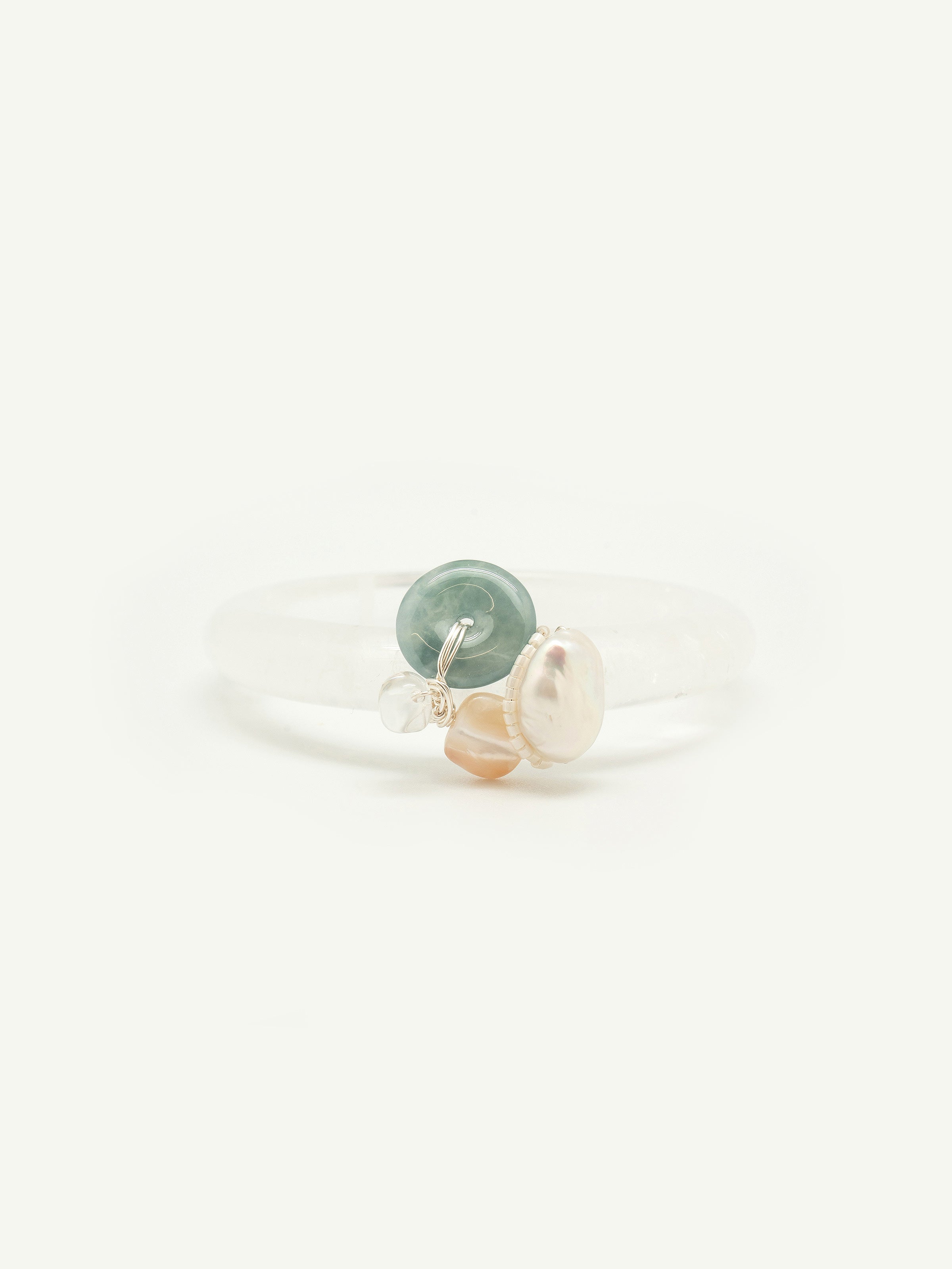 Quartz bangle with jade doughnut, keshi pearl, clear quartz, mother of pearl, toho seed beeds. One of a kind.
