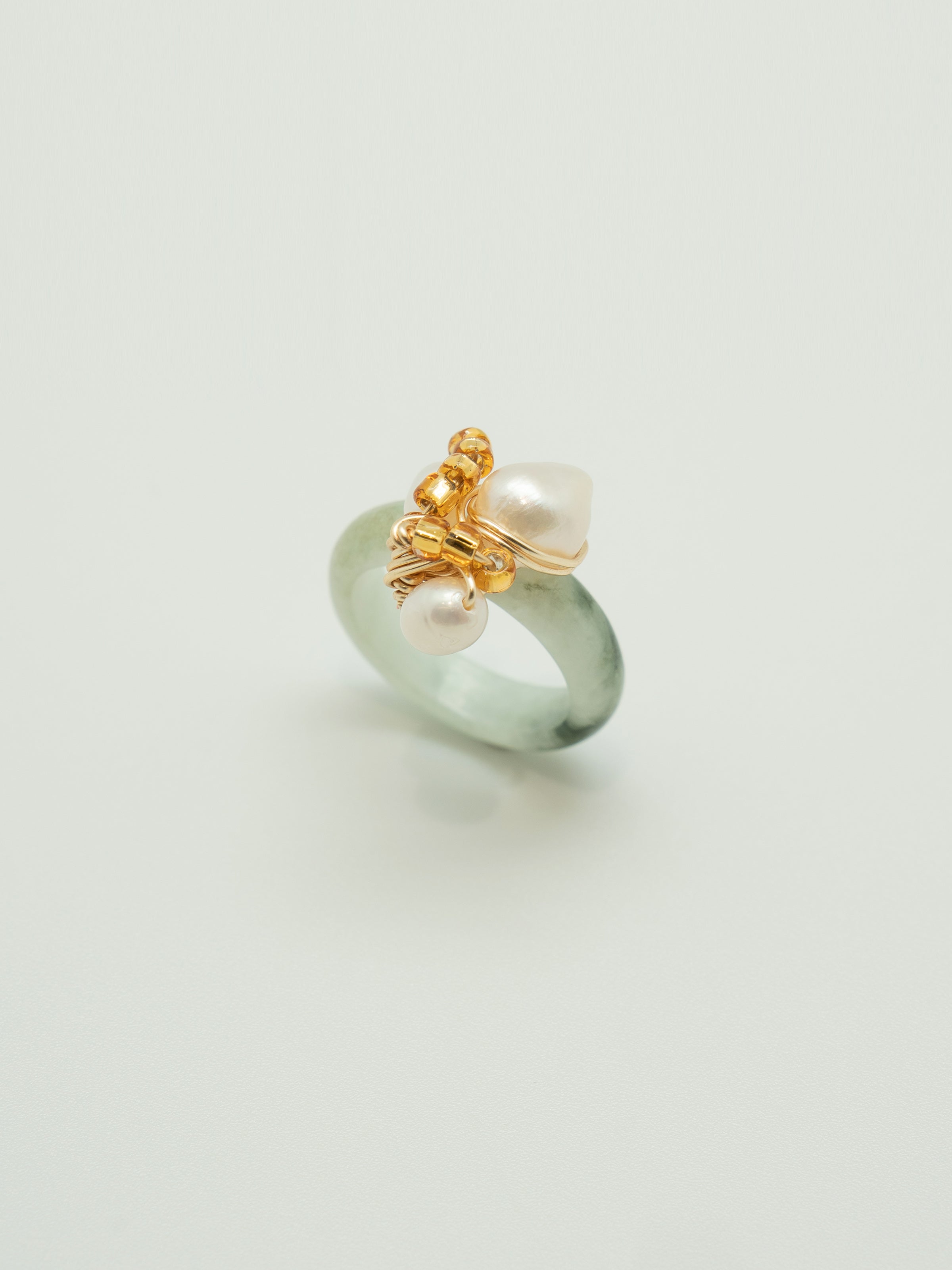 One of a kind jade ring with a trio of pearls, and japanese seed beads.