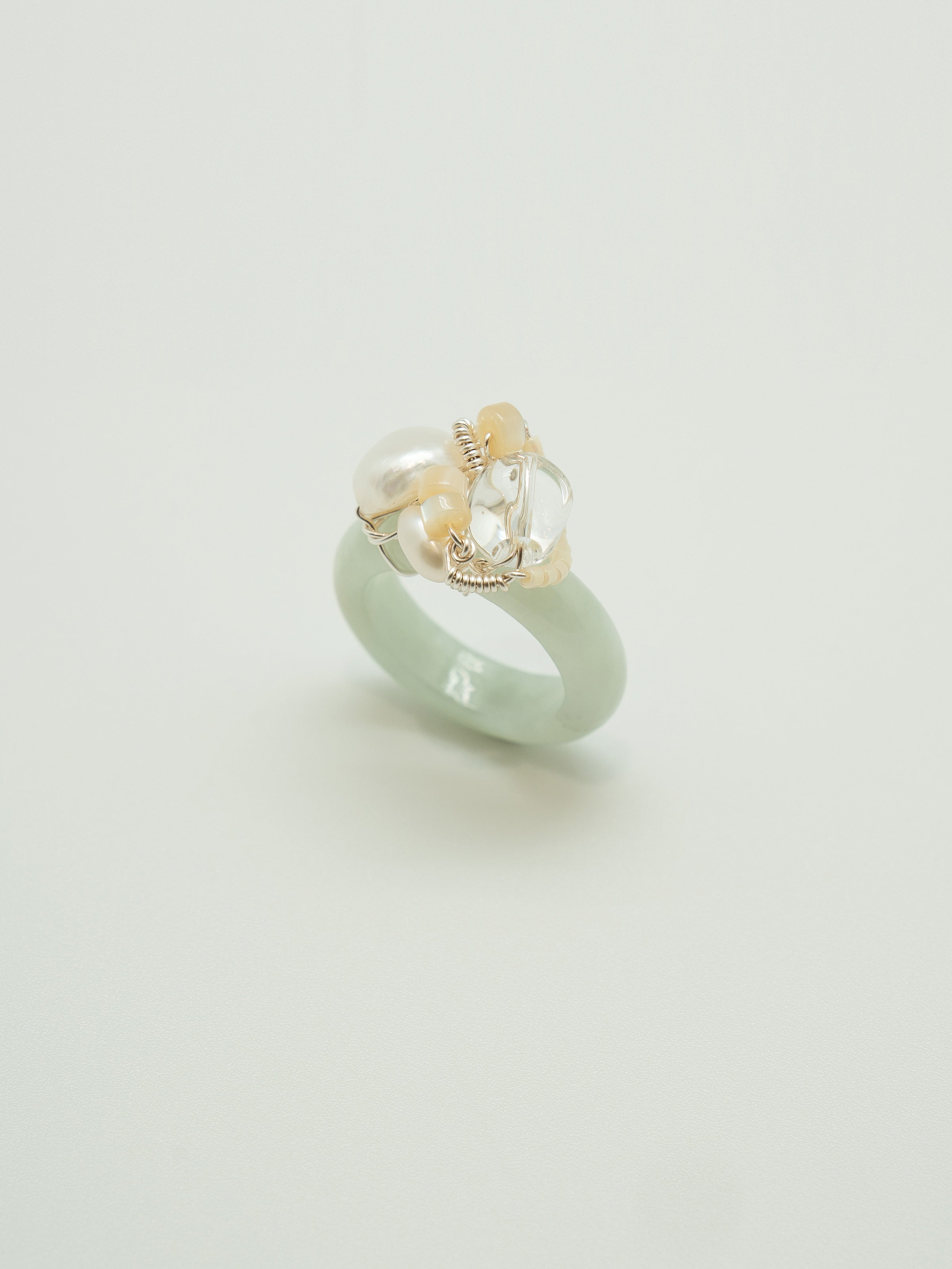One of a kind jade ring with pearl, clear quartz, mother of pearl.