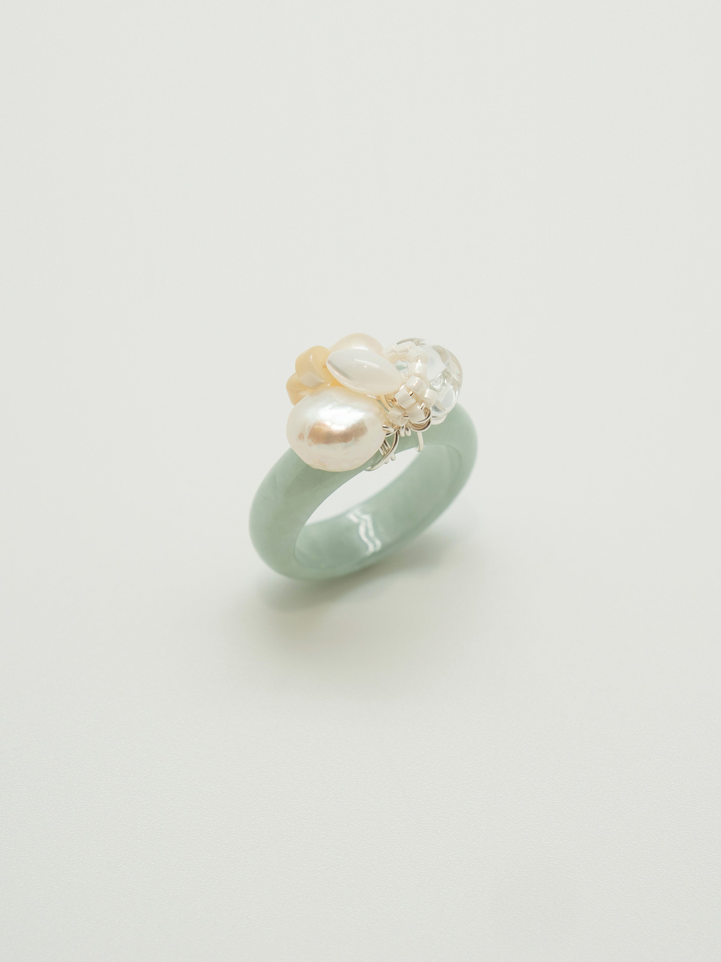 One of a kind jade ring with pearls, clear quartz, mother of pearl, white agate, seed beads.