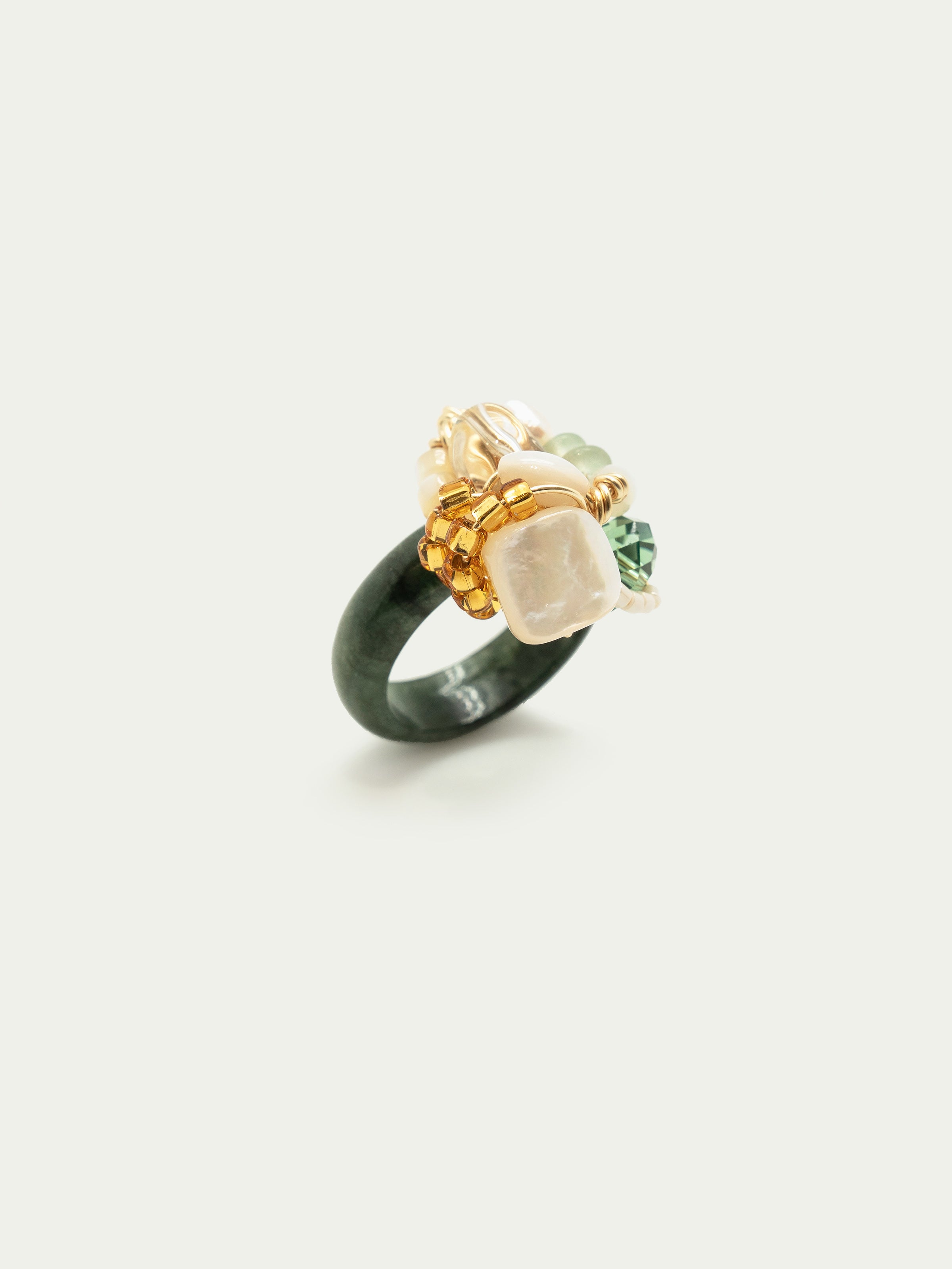 Dark green jade ring with mother of pearl, freshwater pearl, clear quartz, green beryl rondelle, swarovski crystal, japanese seed beads. One of a kind.