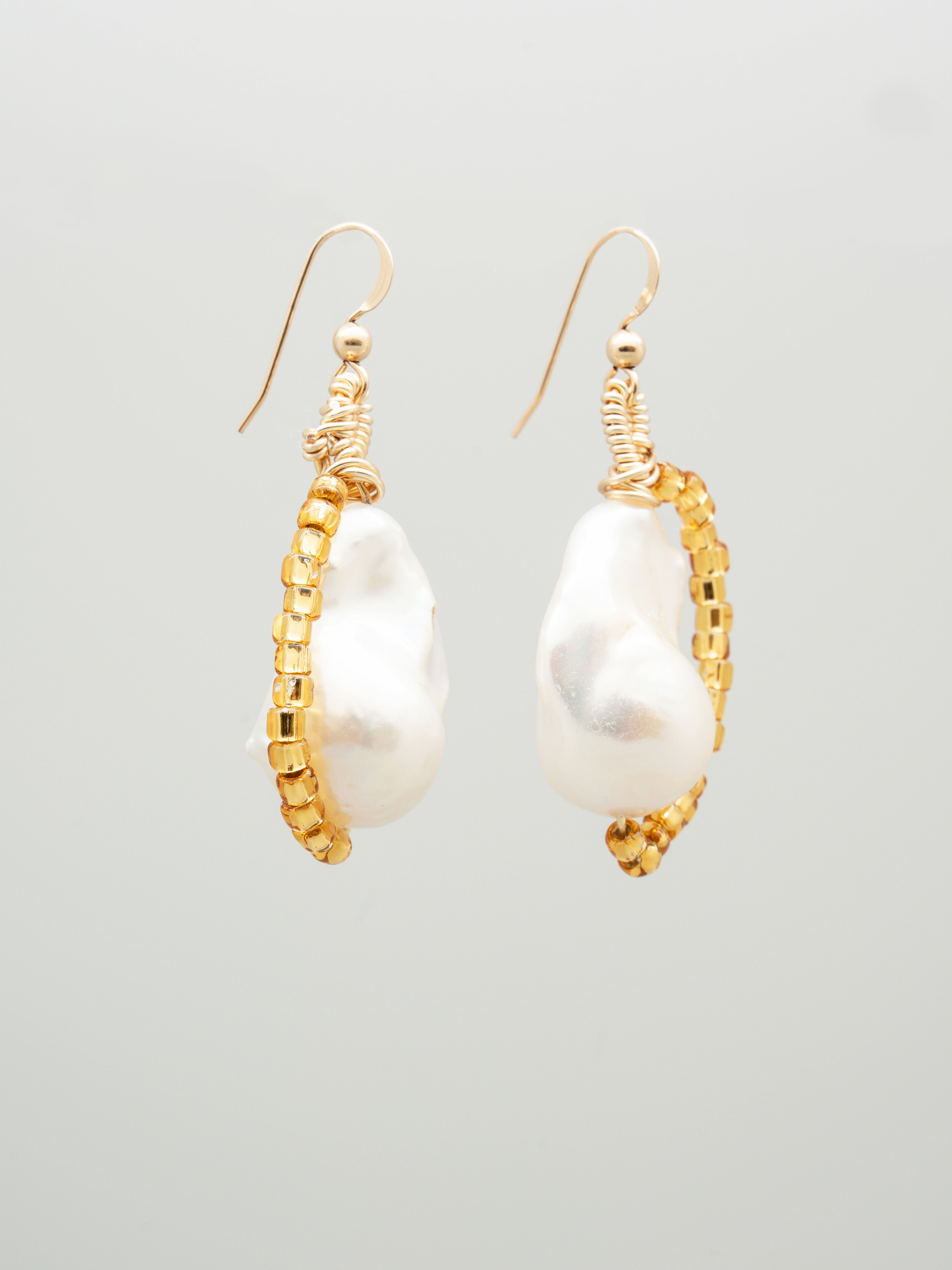 Pair of one-of-a-kind earrings with keshi pearls and gold seed beads