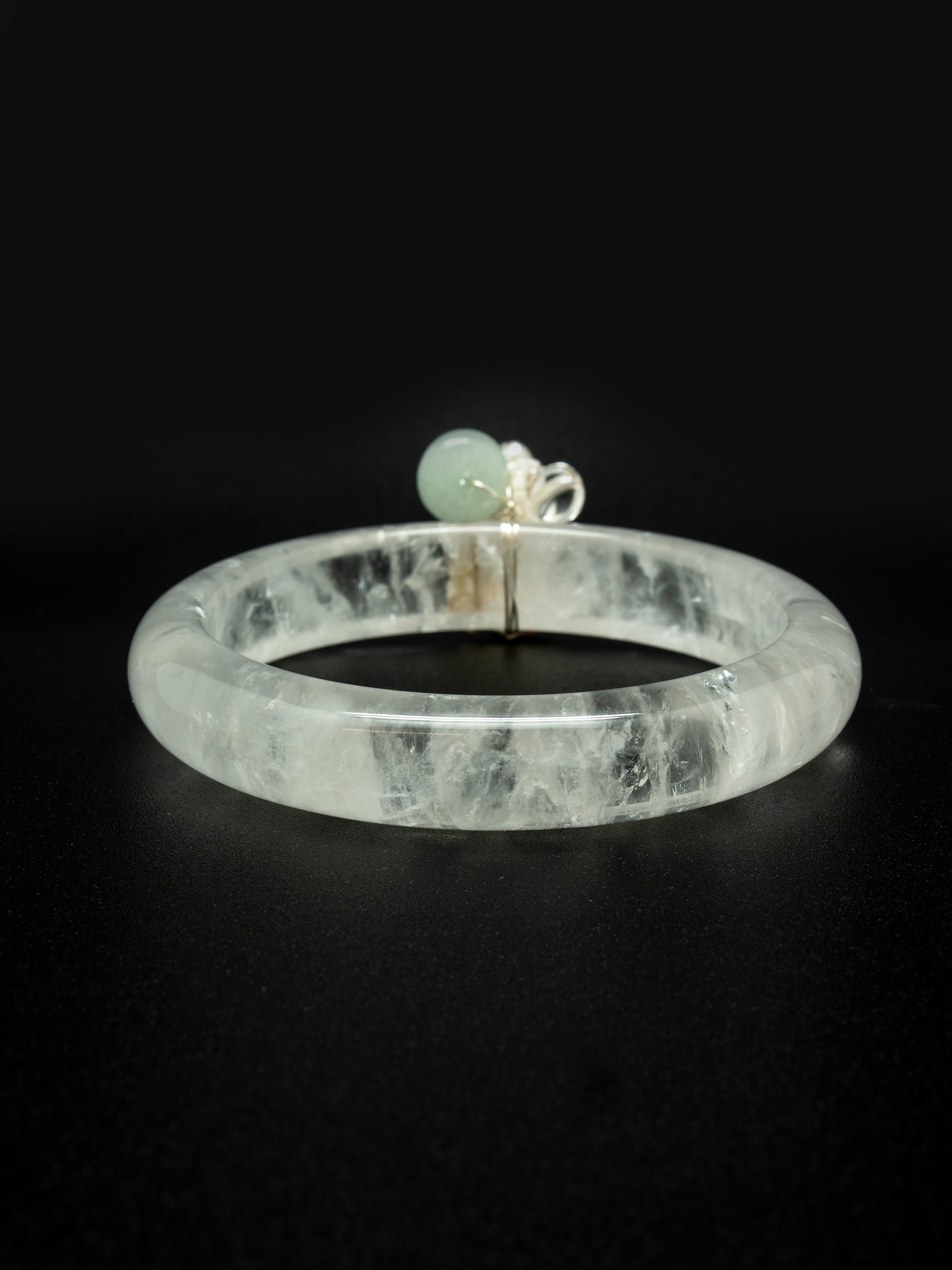 Quartz bangle with jade doughnut, keshi pearl, freshwater pearl, mother of pearl, toho seed beads. One of a kind.