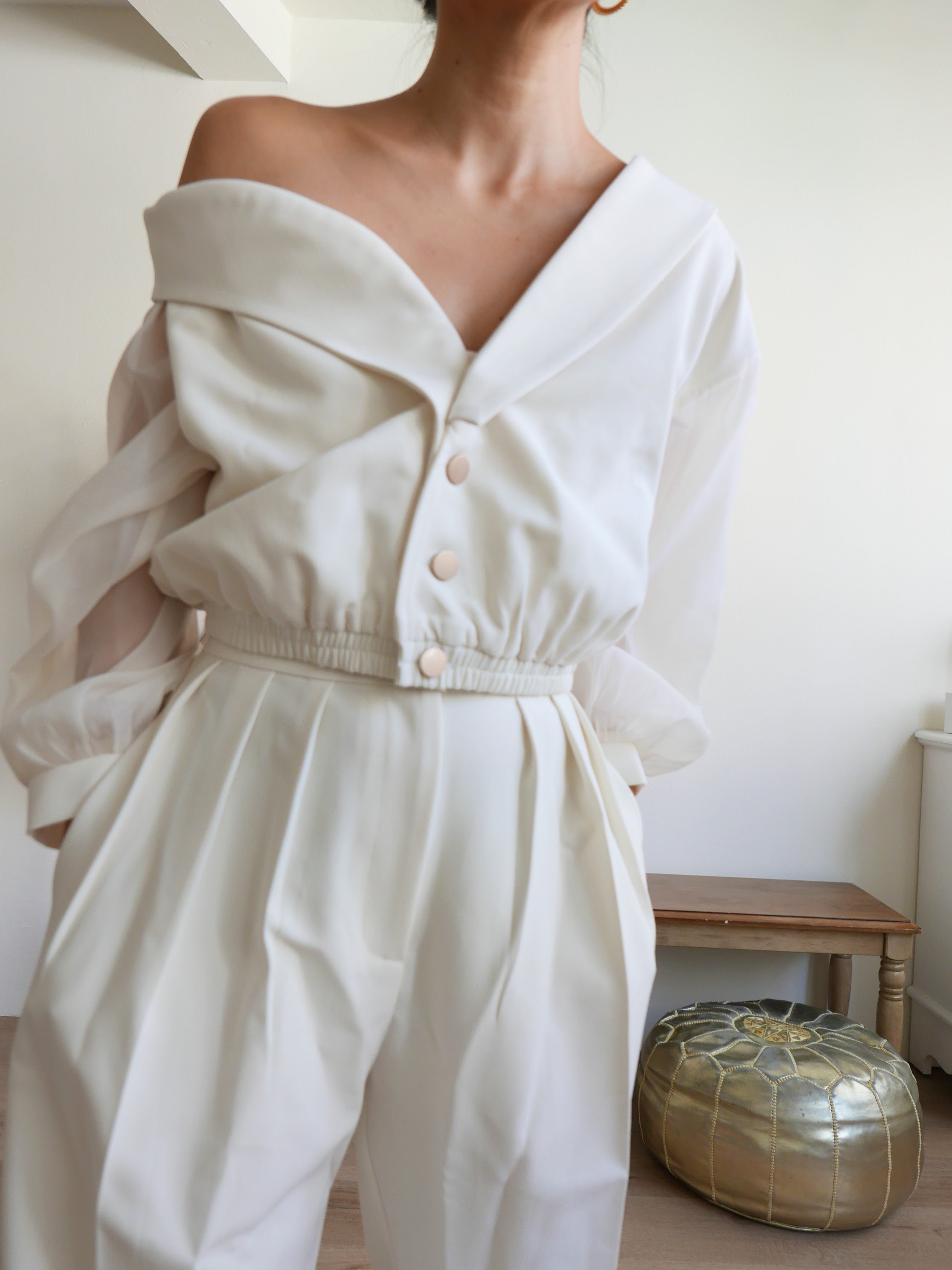 Women's white multiway off-shoulder top or outerwear blazer with gold buttons