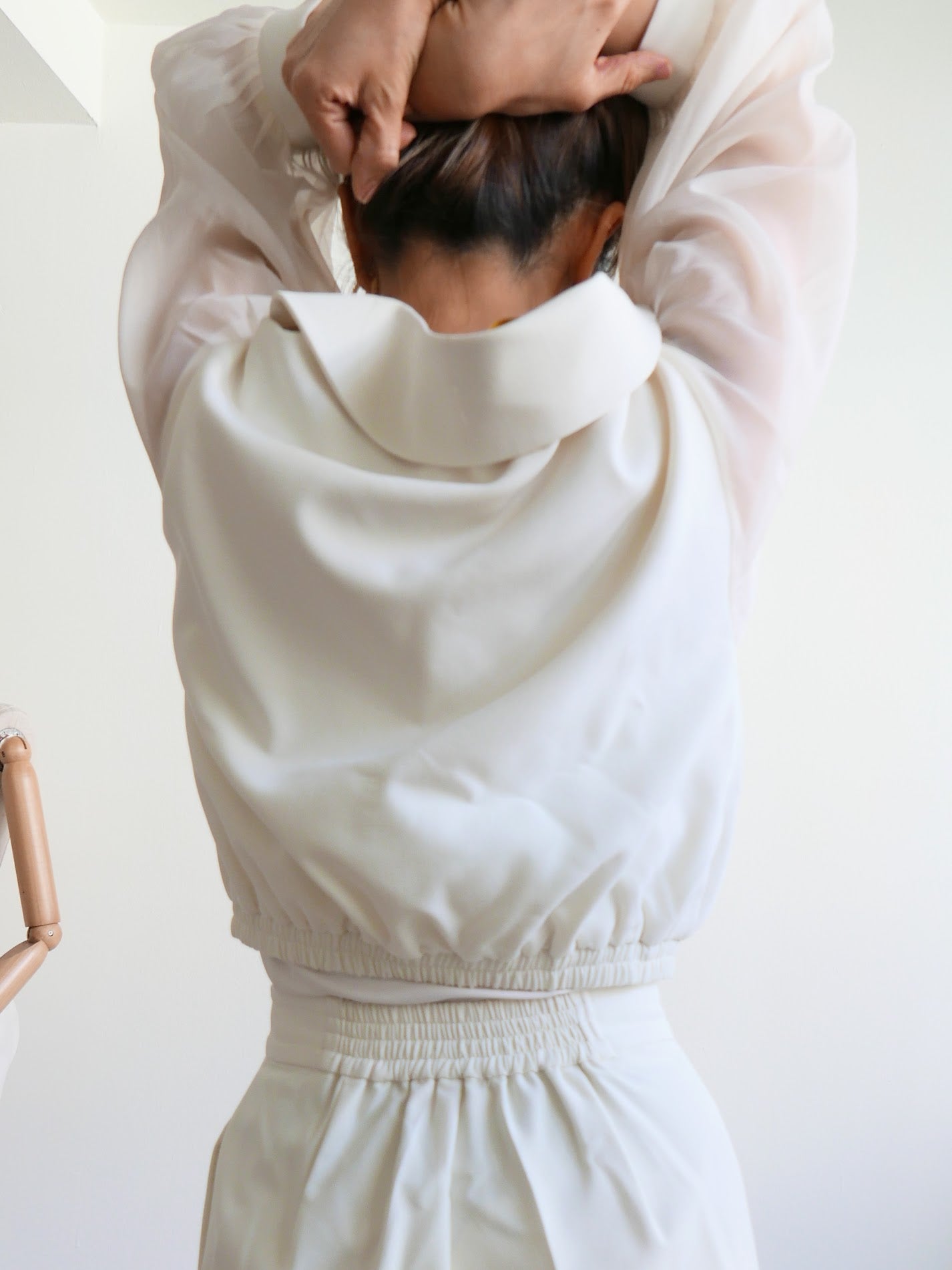 Women's white multiway off-shoulder top or outerwear blazer with gold buttons