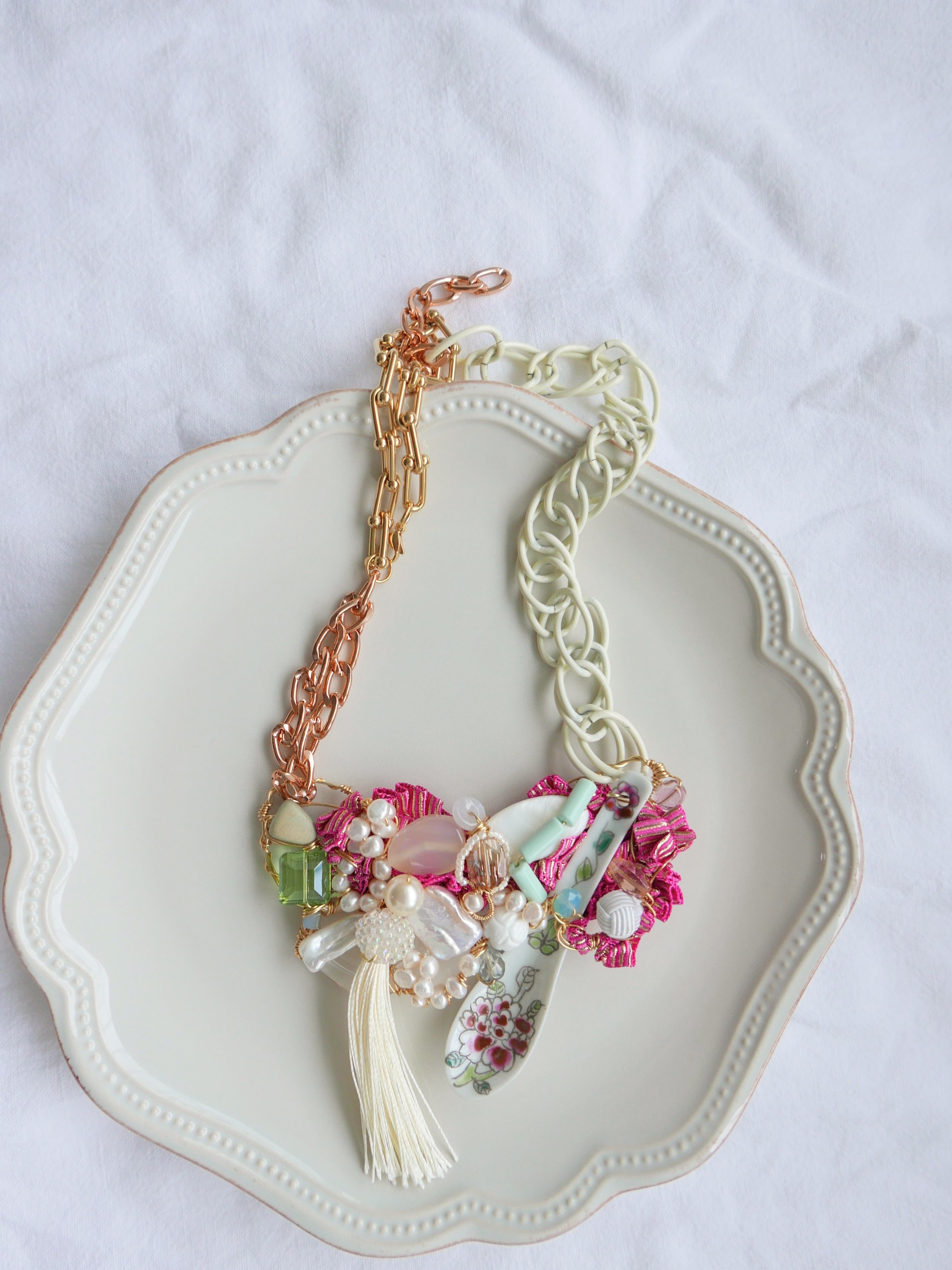 Women's bespoke one-of-a-kind statement necklace with porcelain spoon