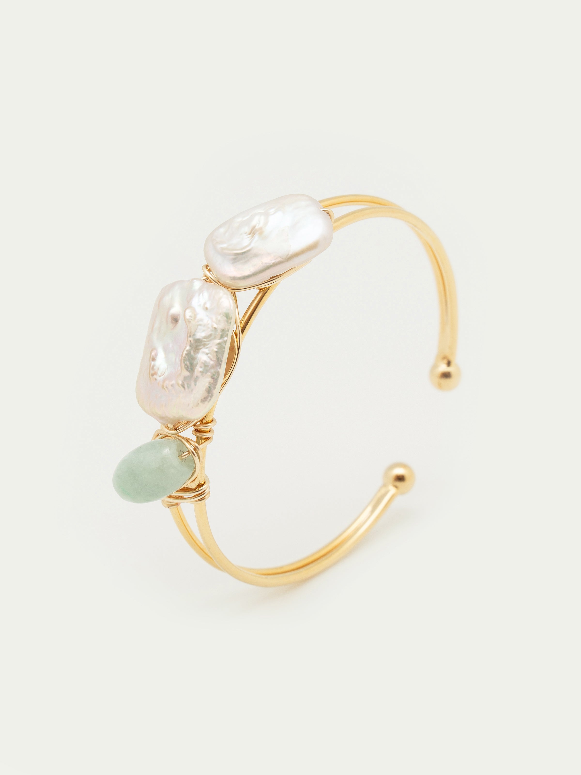 Gold cuff bangle with two pearls and jade. One of a kind.