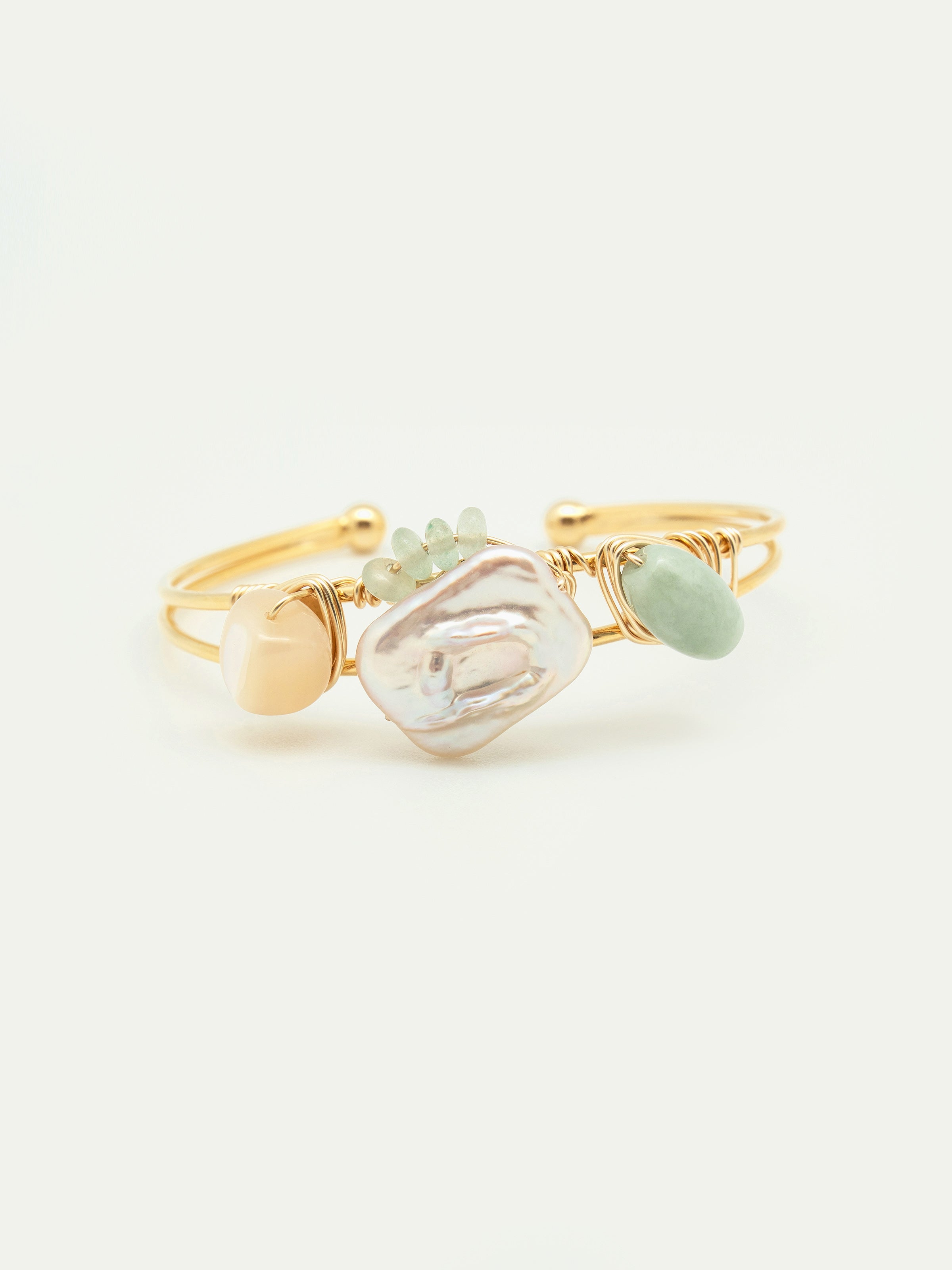 Gold cuff bangle with pearl, mother of pearl, jade, green beryl rondelle. One of a kind.