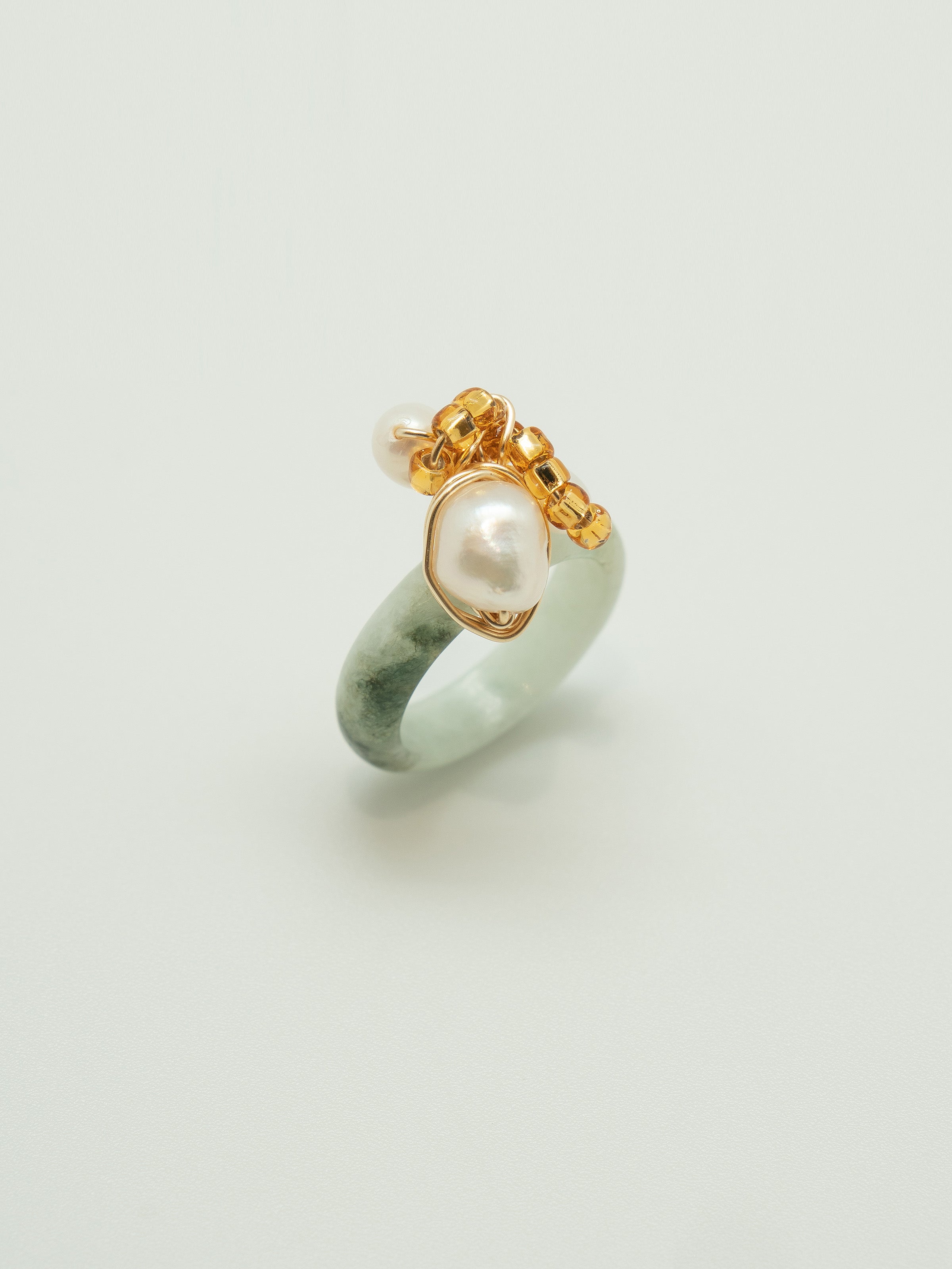 One of a kind jade ring with a trio of pearls, and japanese seed beads.