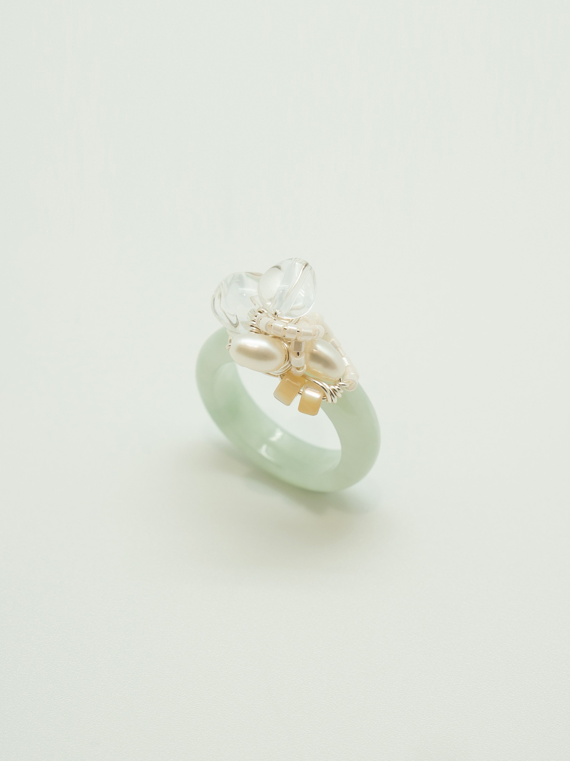 One of a kind jade ring with pearls, clear quartz, mother of pearl cylindrical beads.