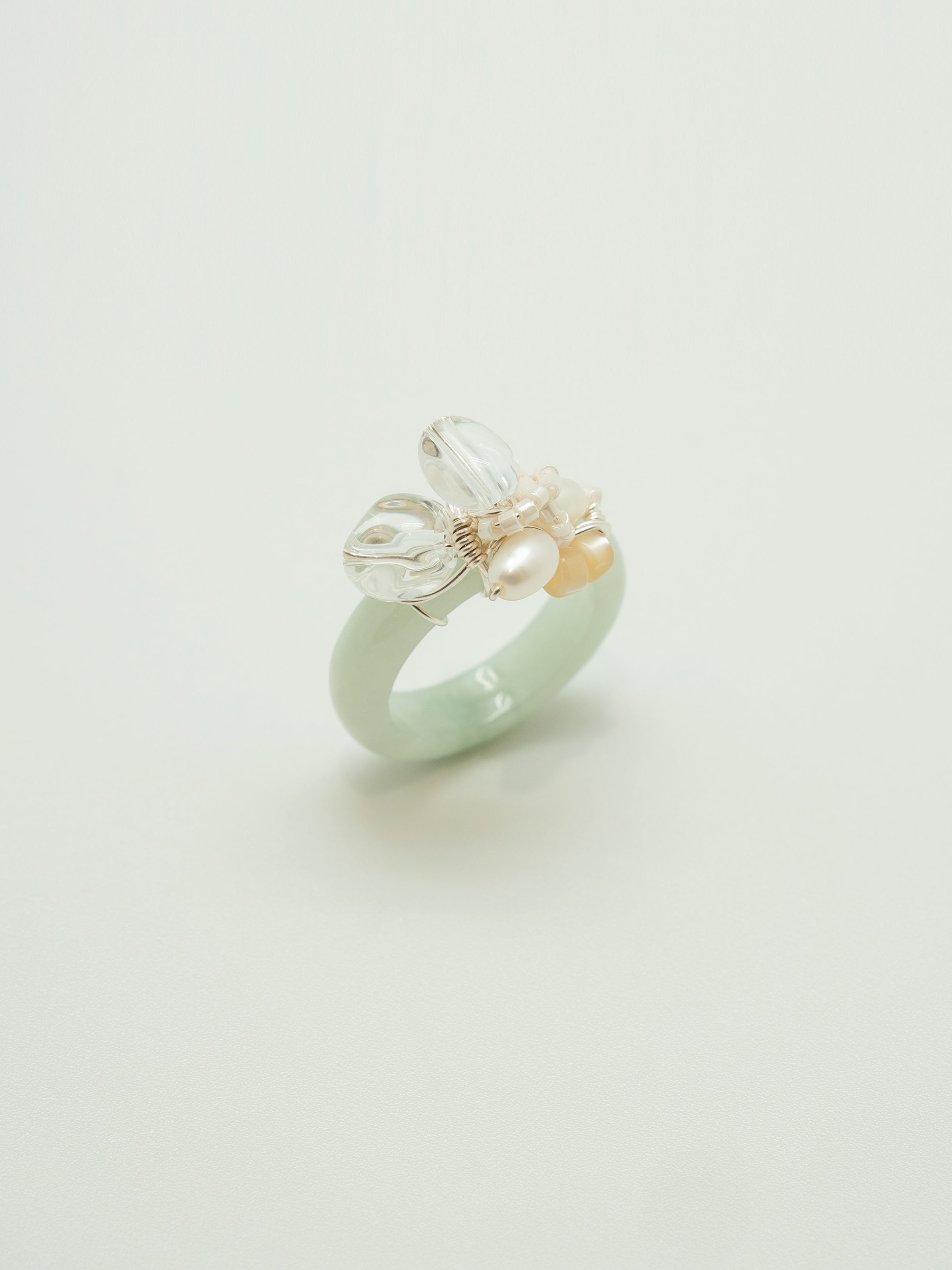 One of a kind jade ring with pearls, clear quartz, mother of pearl cylindrical beads.