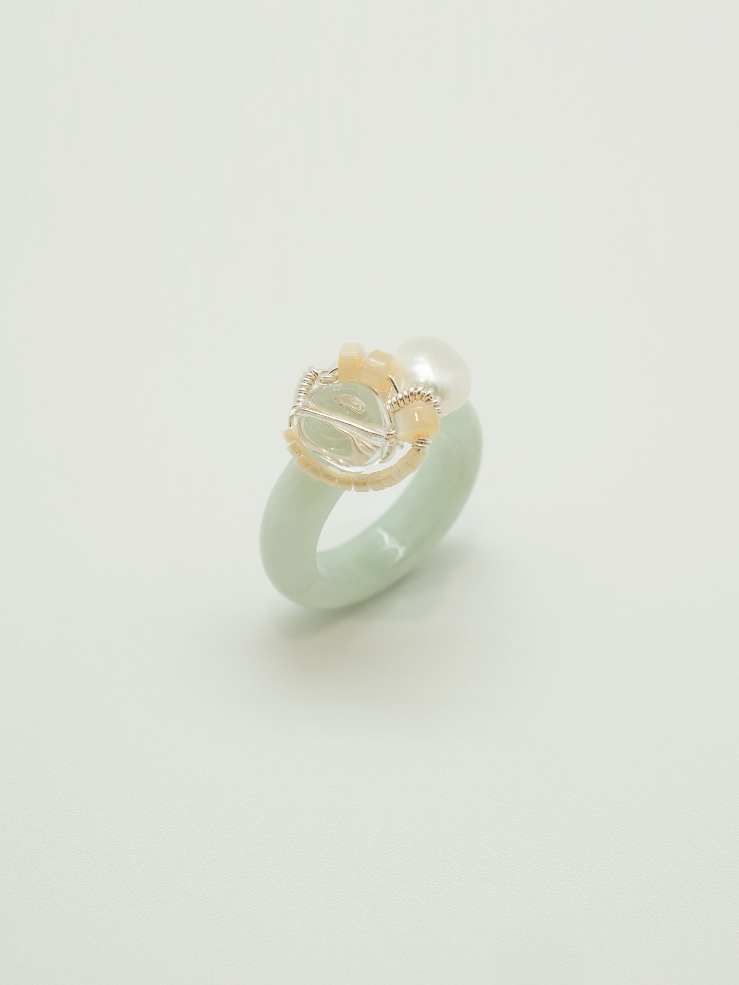 One of a kind jade ring with pearl, clear quartz, mother of pearl.
