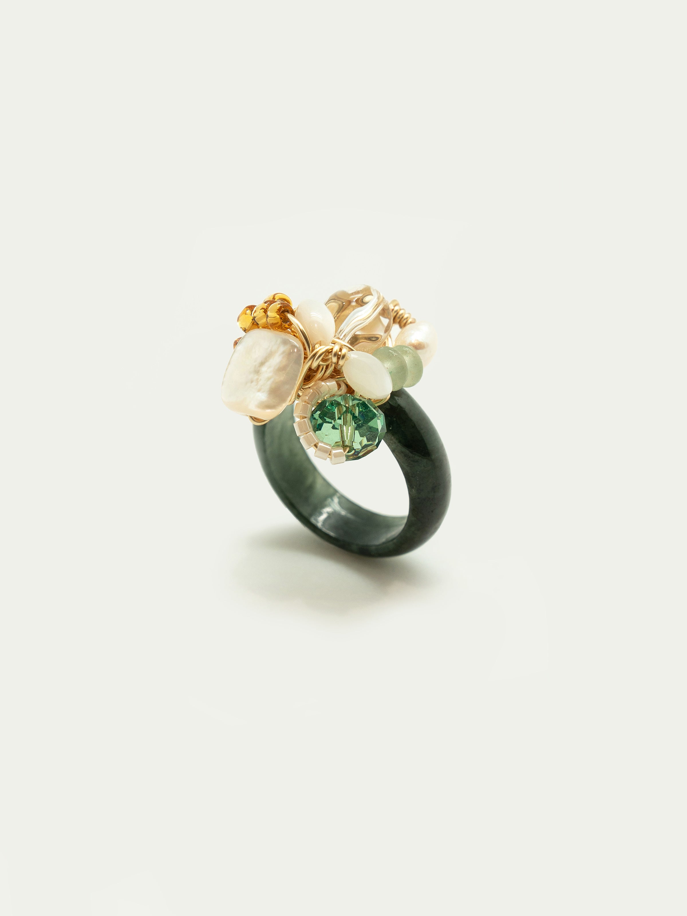 Dark green jade ring with mother of pearl, freshwater pearl, clear quartz, green beryl rondelle, swarovski crystal, japanese seed beads. One of a kind.