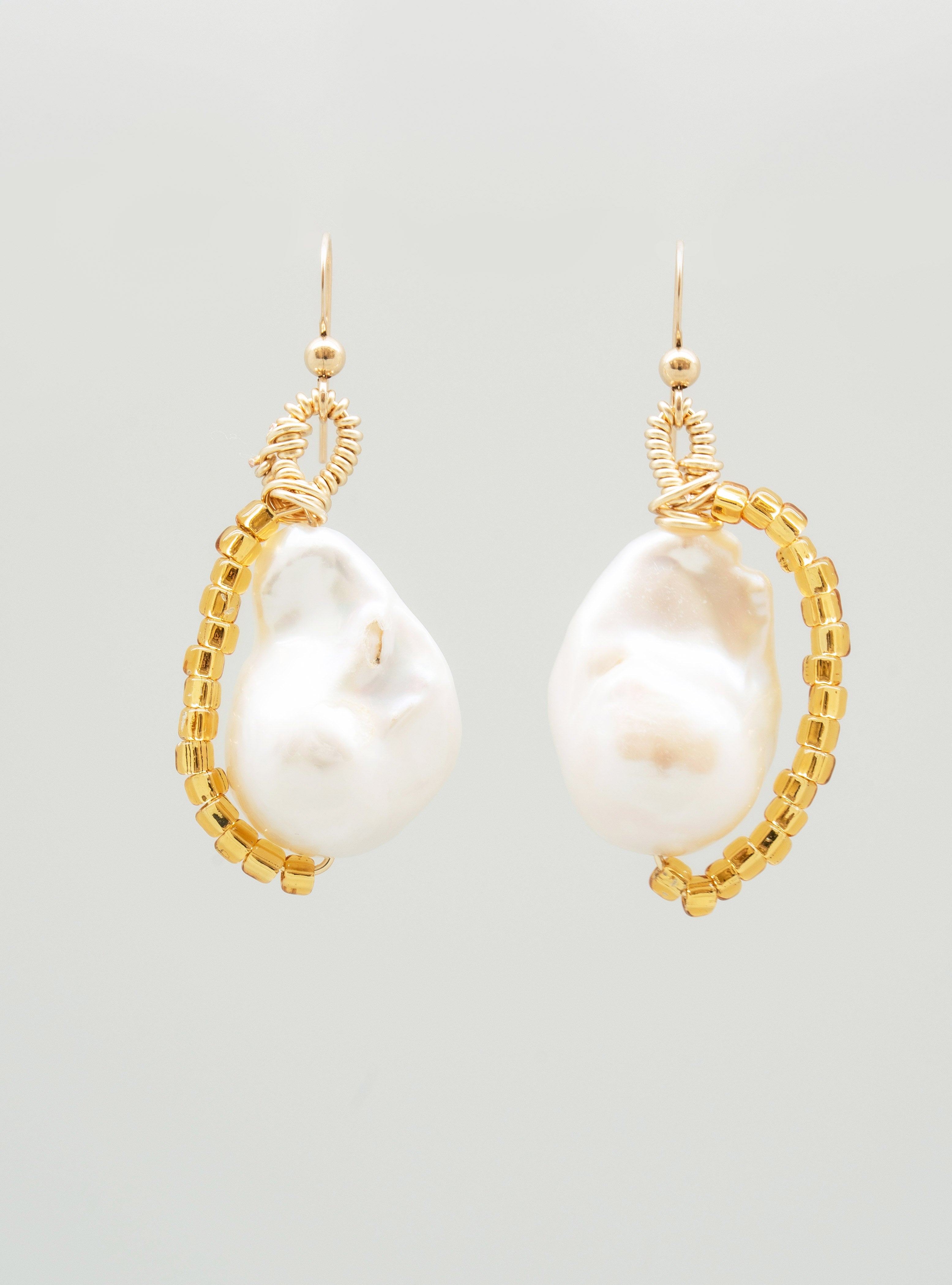 Pair of one-of-a-kind earrings with keshi pearls and gold seed beads