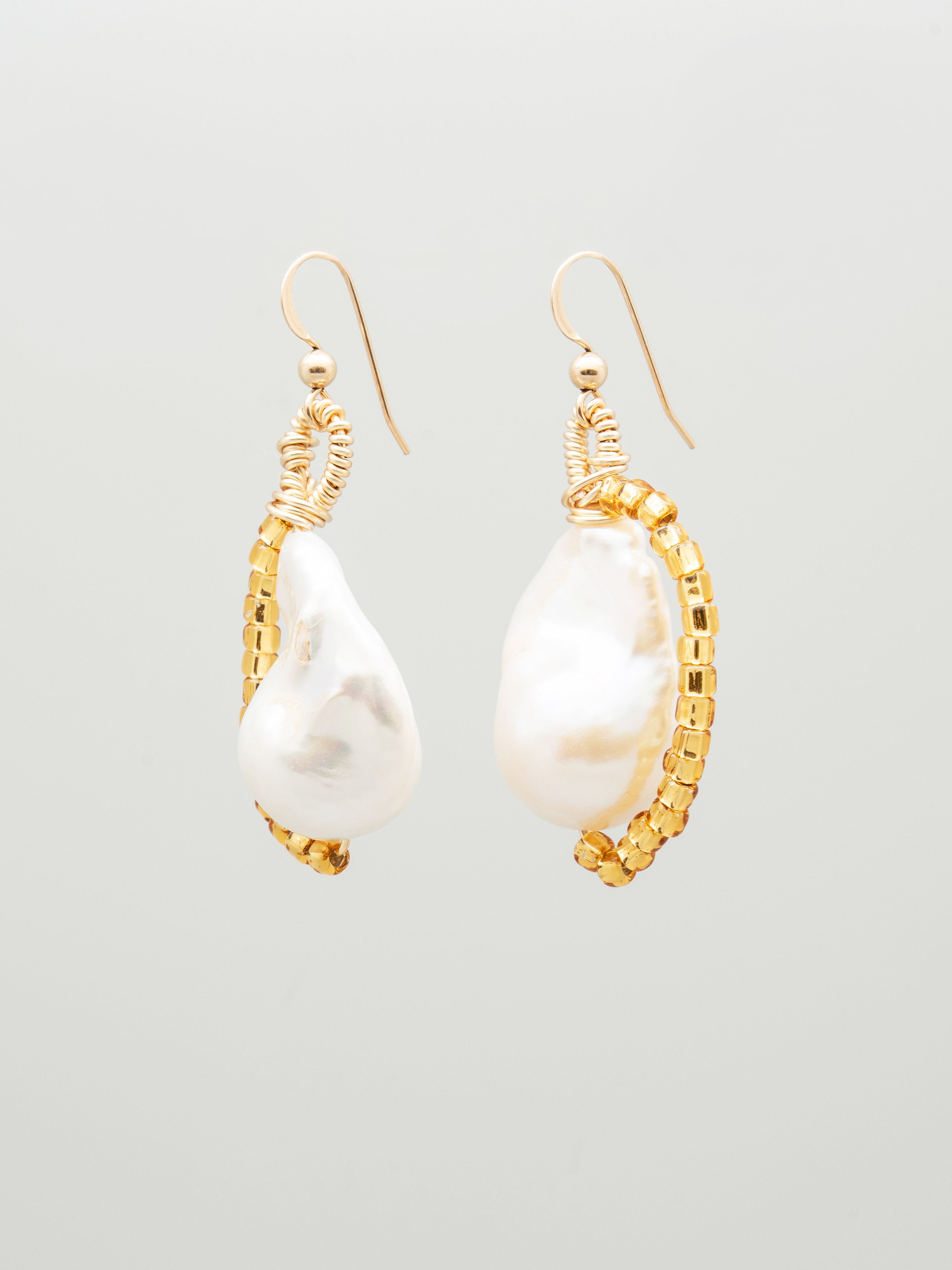 Pair of one-of-a-kind earrings with keshi pearls and gold seed beads