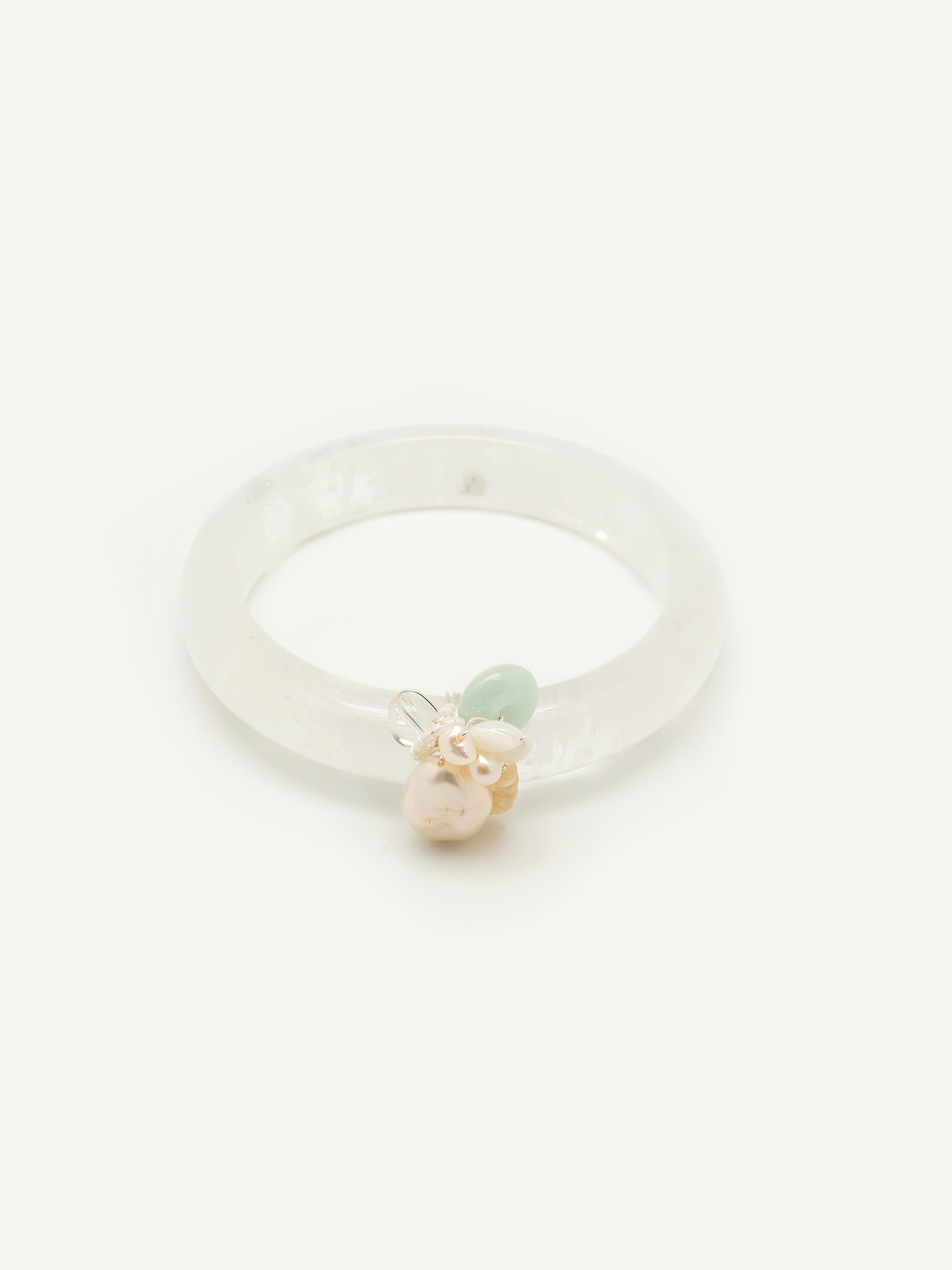 Quartz bangle with jade doughnut, keshi pearl, freshwater pearl, mother of pearl, toho seed beads. One of a kind.