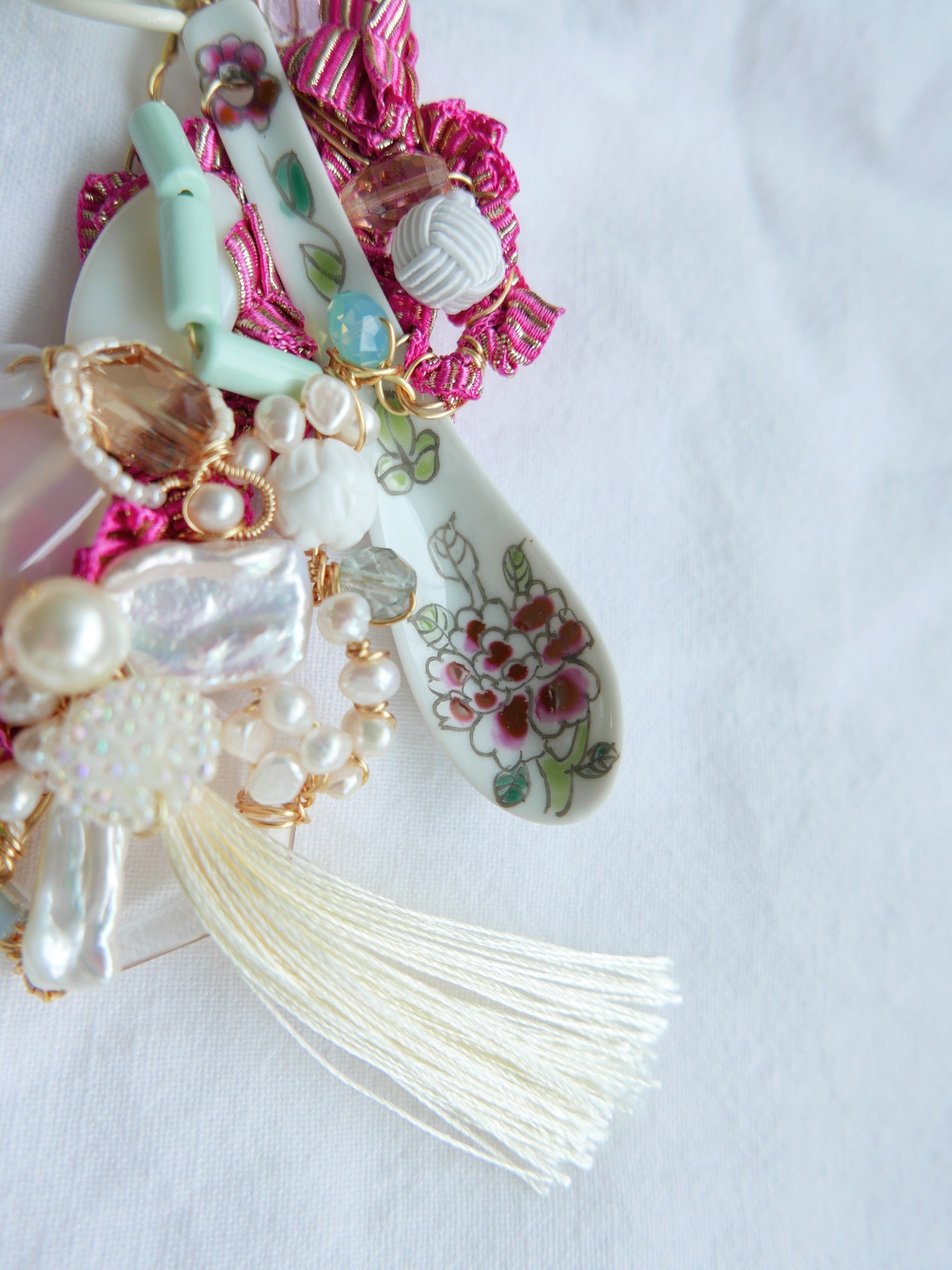 Women's bespoke one-of-a-kind statement necklace with porcelain spoon