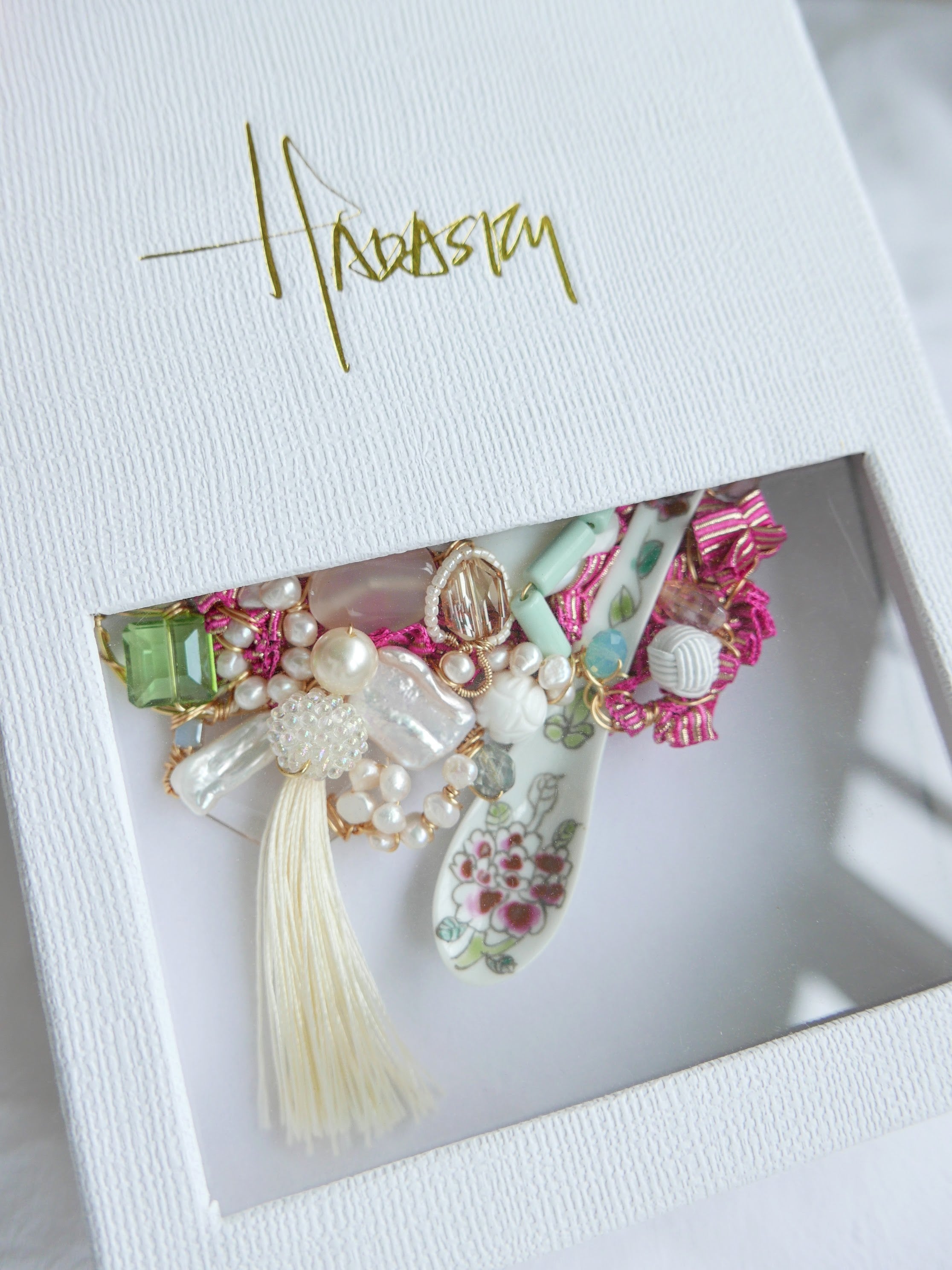 Women's bespoke one-of-a-kind statement necklace with porcelain spoon