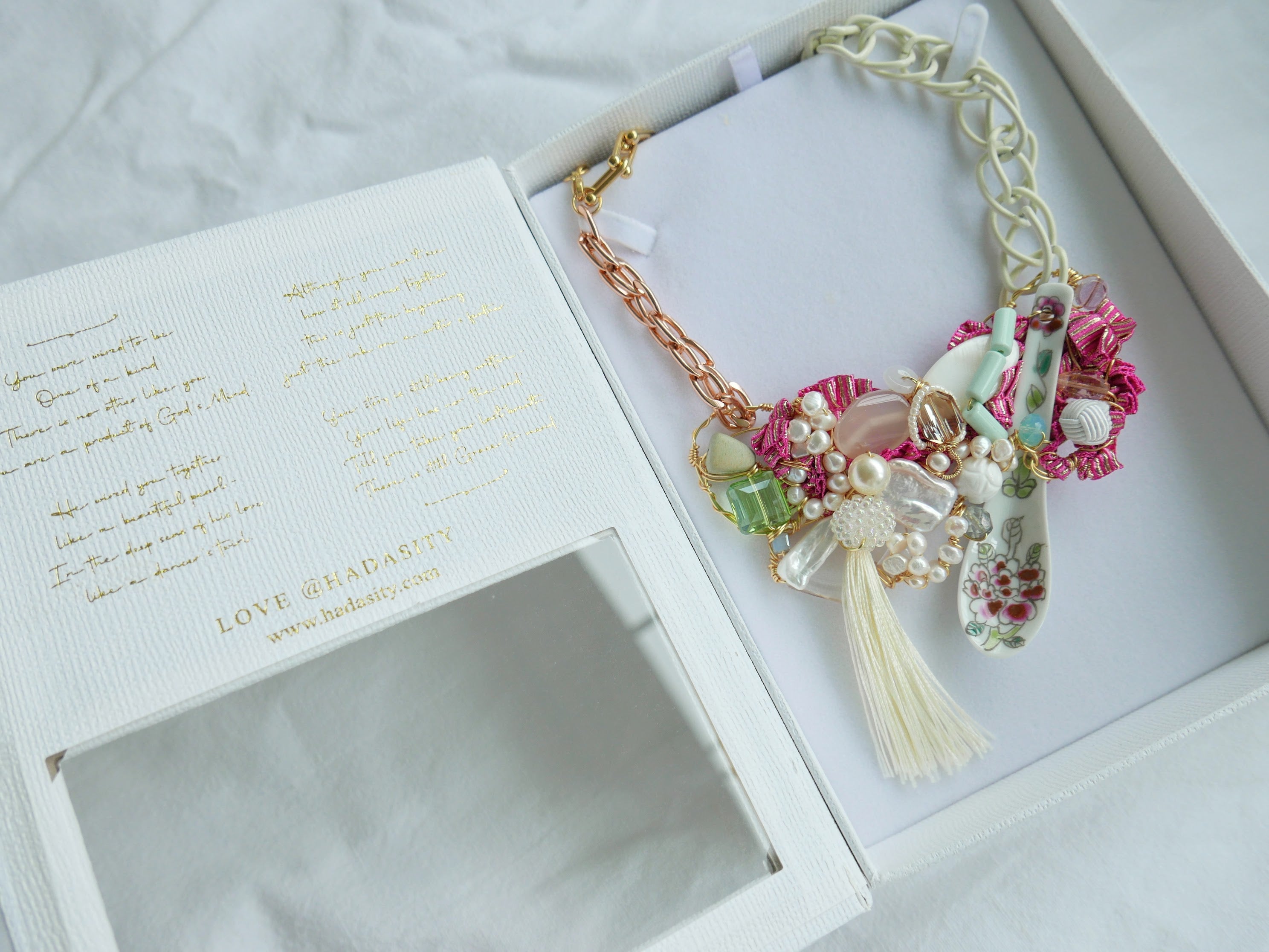 Women's bespoke one-of-a-kind statement necklace with porcelain spoon