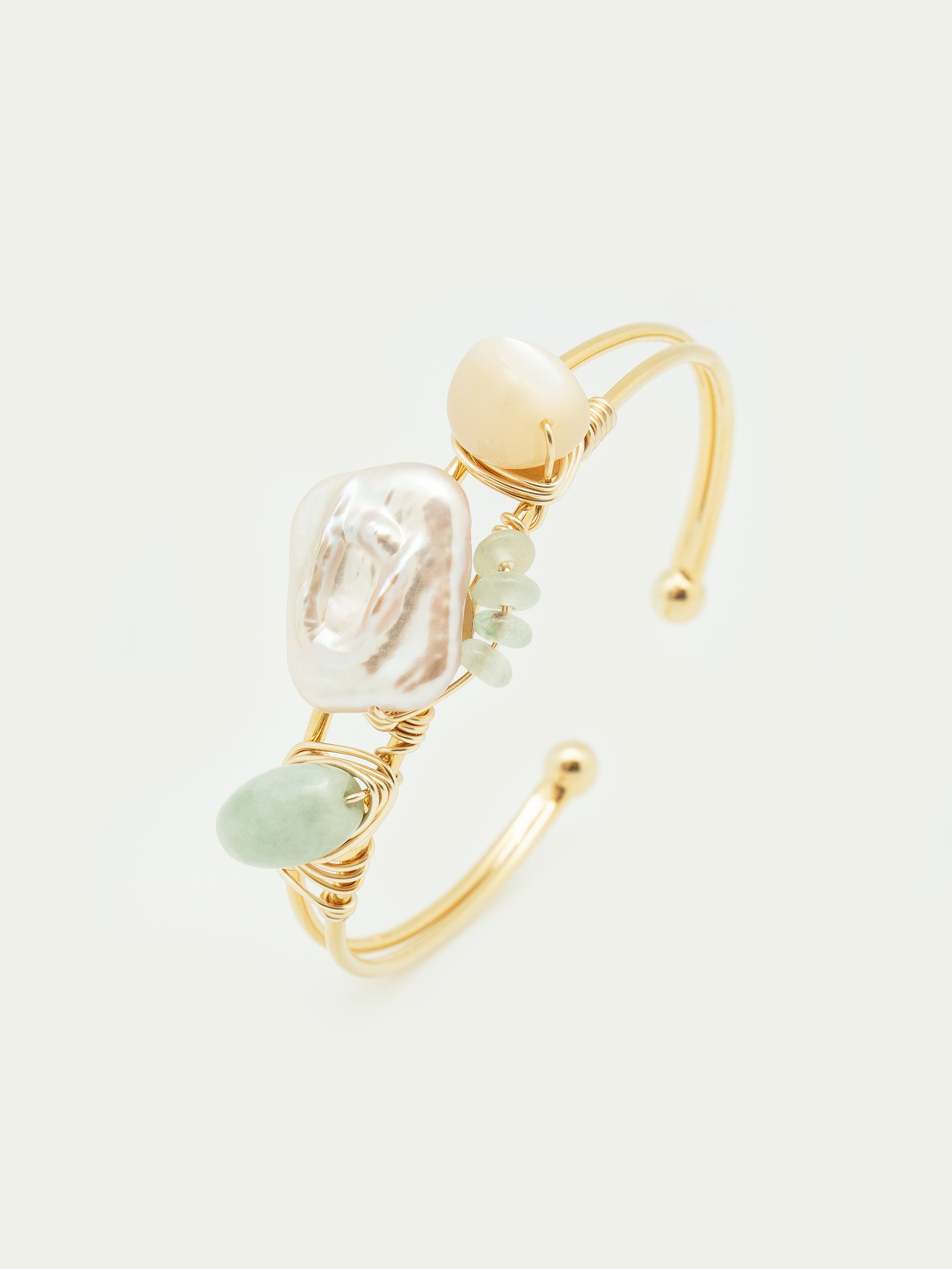 Gold cuff bangle with pearl, mother of pearl, jade, green beryl rondelle. One of a kind.